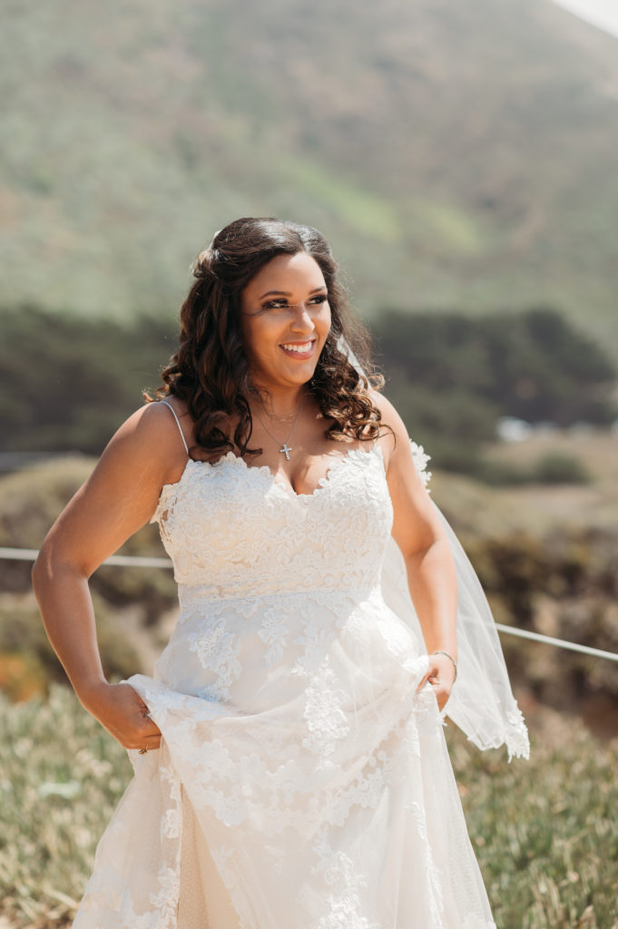 Bride on a sunny day in Big Sur for first look in wedding dress